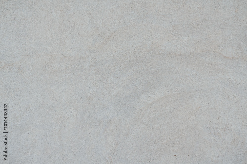 Naklejka premium Textured Plaster Wall Background. A close-up of a textured plaster wall with an abstract rough surface. The neutral light beige color and irregular patterns create a natural and artistic backdrop. 