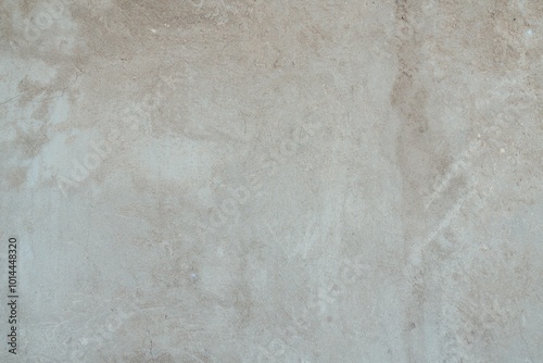 Textured Plaster Wall Background. A close-up of a textured plaster wall with an abstract rough surface. The neutral light beige color and irregular patterns create a natural and artistic backdrop. 