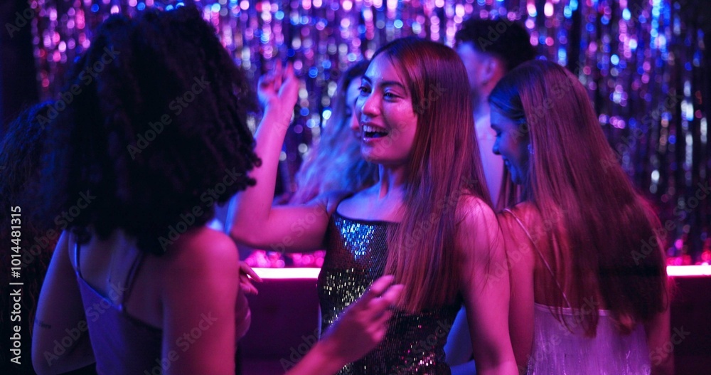 Dancing, fun and friends in club, night and smile of women, bonding and celebration in weekend or group. Lights, dark and listening to music, dancer and people in rave, disco or festival in New Year