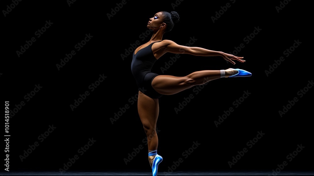 Fototapeta premium Grace in Motion: A ballerina, poised in a captivating arabesque, embodies grace and artistry against a dramatic black backdrop. Her vibrant energy and athleticism illuminate the stage.