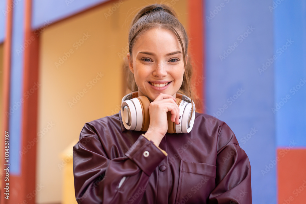 Young pretty girl at outdoors With happy expression Young pretty girl at outdoors With happy expression