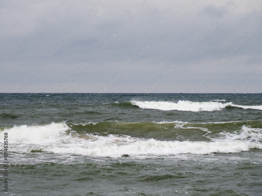 Fiery Waves of the Dark Green Ocean Under a Gloomy Sky Fiery Waves of the Dark Green Ocean Under a Gloomy Sky