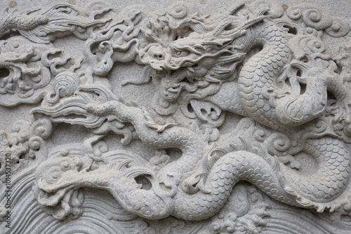 Chinese traditional cultural element architecture - stone carving nine Dragon Wall.