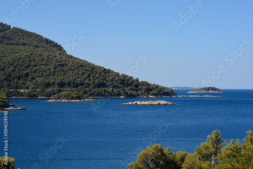 View from the coast of the Peljesac peninsula towards the islets Miriste, Kosmac, and Lirica in Croatia photo