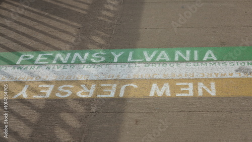 The border line sign between the Pennsylvania state and New Jersey state on the bridge