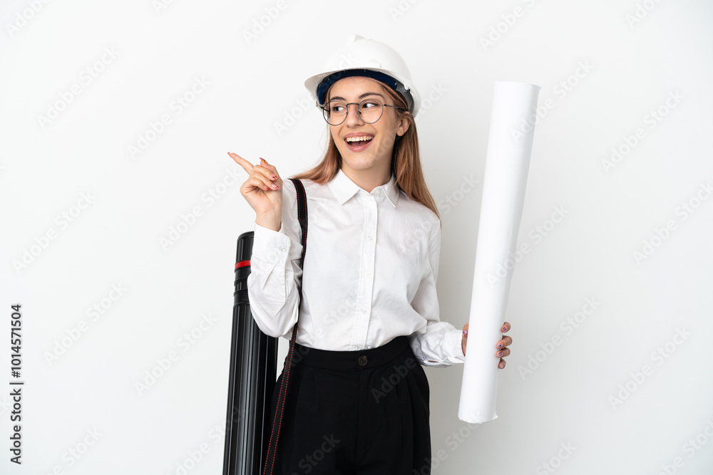 Young architect woman with helmet and holding blueprints isolated on white background intending to realizes the solution while lifting a finger up Young architect woman with helmet and holding blueprints isolated on white background intending to realizes the solution while lifting a finger up