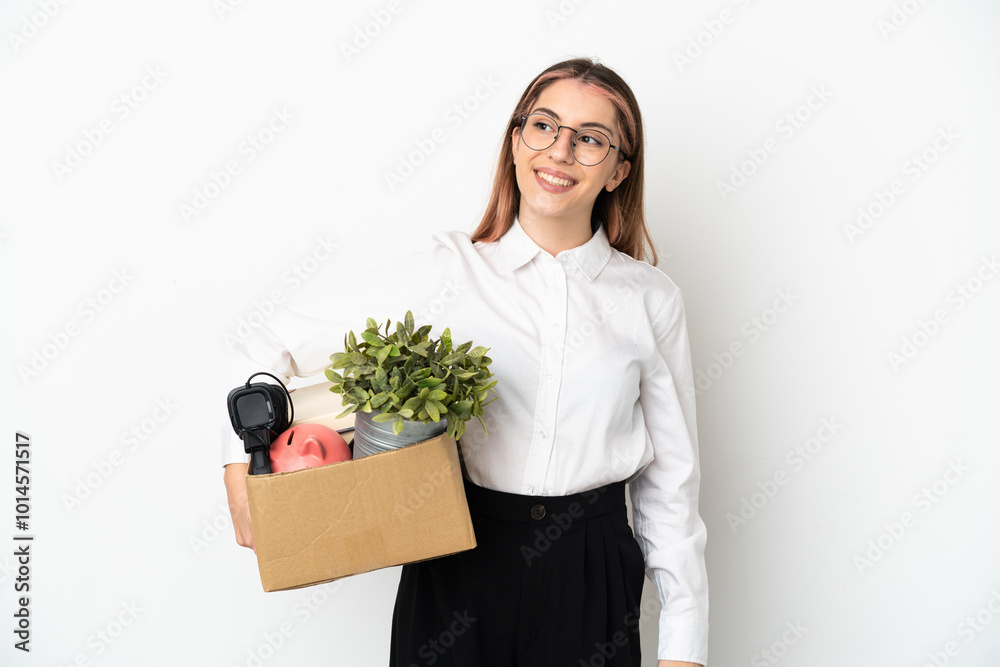 Young caucasian woman moving in new home among boxes isolated on white background thinking an idea while looking up Young caucasian woman moving in new home among boxes isolated on white background thinking an idea while looking up