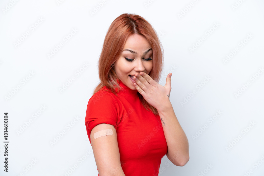 Young Russian girl wearing band-aids isolated on pink background with surprise and shocked facial expression Young Russian girl wearing band-aids isolated on pink background with surprise and shocked facial expression