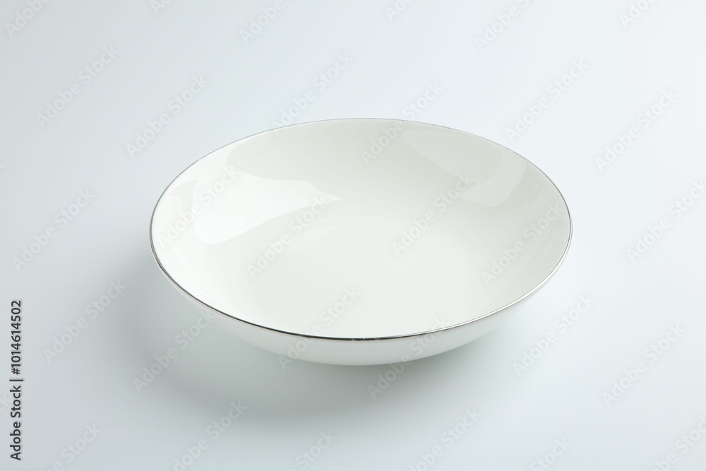 One empty ceramic bowl isolated on white One empty ceramic bowl isolated on white