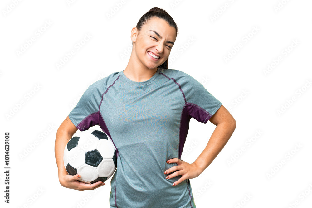 Young football player Woman over isolated chroma key background posing with arms at hip and smiling Young football player Woman over isolated chroma key background posing with arms at hip and smiling