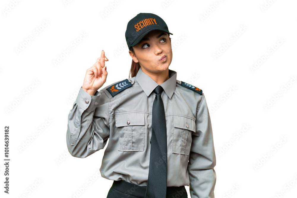 Young safeguard woman over isolated chroma key background with fingers crossing and wishing the best Young safeguard woman over isolated chroma key background with fingers crossing and wishing the best