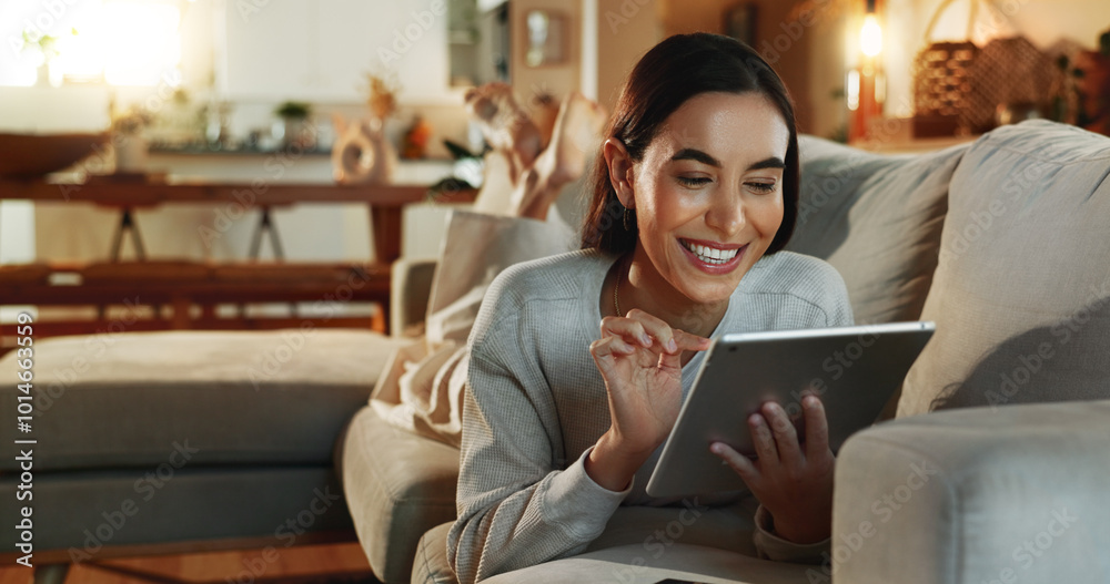 © HockleyM4/peopleimages.com - Relax, smile and tablet with woman on sofa in living room of home for online shopping at night. App, ecommerce and technology with happy person in apartment for social media browsing on weekend © HockleyM4/peopleimages.com - Relax, smile and tablet with woman on sofa in living room of home for online shopping at night. App, ecommerce and technology with happy person in apartment for social media browsing on weekend