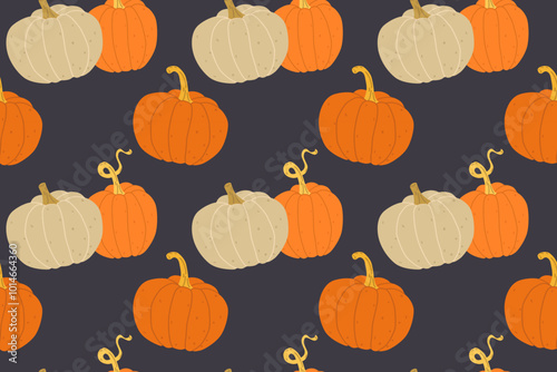 Hand drawn seamless pattern with pumpkins on dark background. Seasonal vector illustration design for wallpapers, textiles, prints, cards, banners
