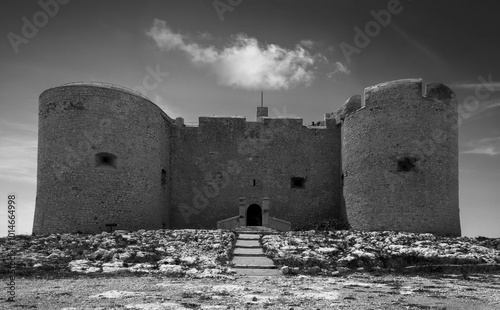 Black-white pictures of the famous Chateau D'If in France  not far away from the coast of the city of Marseille. It is famous for being part of adventure novel The Count of Monte Christo