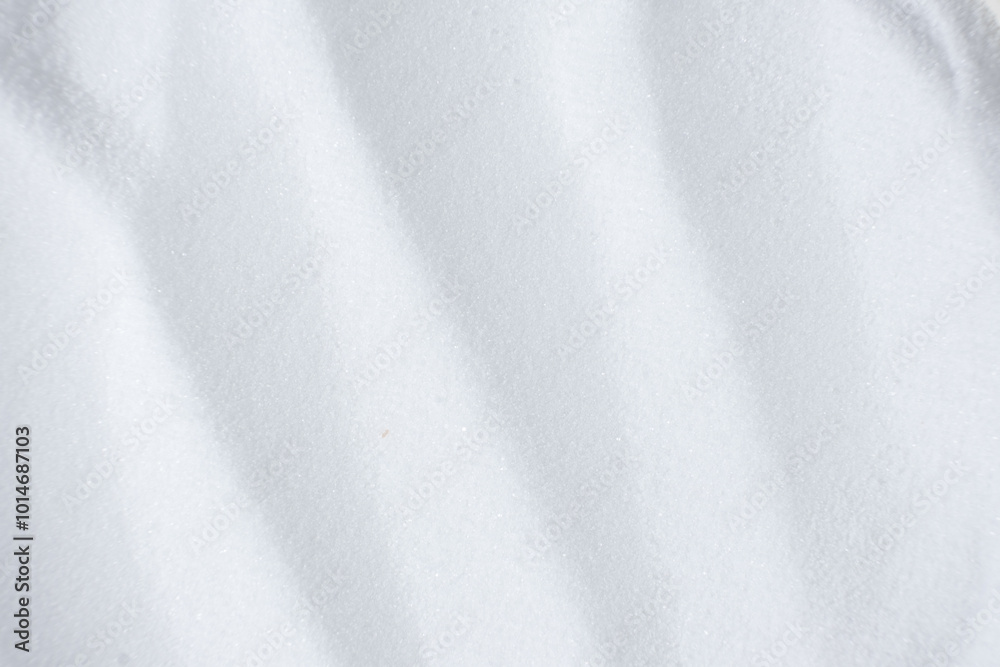 Natural white food salt fine grind, top view Natural white food salt fine grind, top view