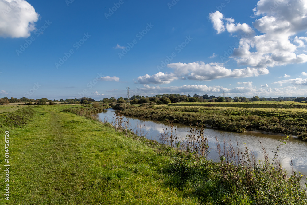 A view along the River Ouse towards Hamsey in Sussex, on a sunny autumn day A view along the River Ouse towards Hamsey in Sussex, on a sunny autumn day