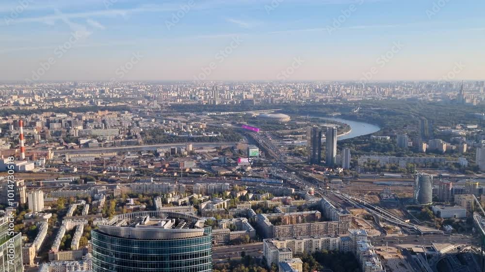 Moscow city landscape from a height, Cars are driving through the city center of Moscow, Russia on a sunny day Moscow city landscape from a height, Cars are driving through the city center of Moscow, Russia on a sunny day