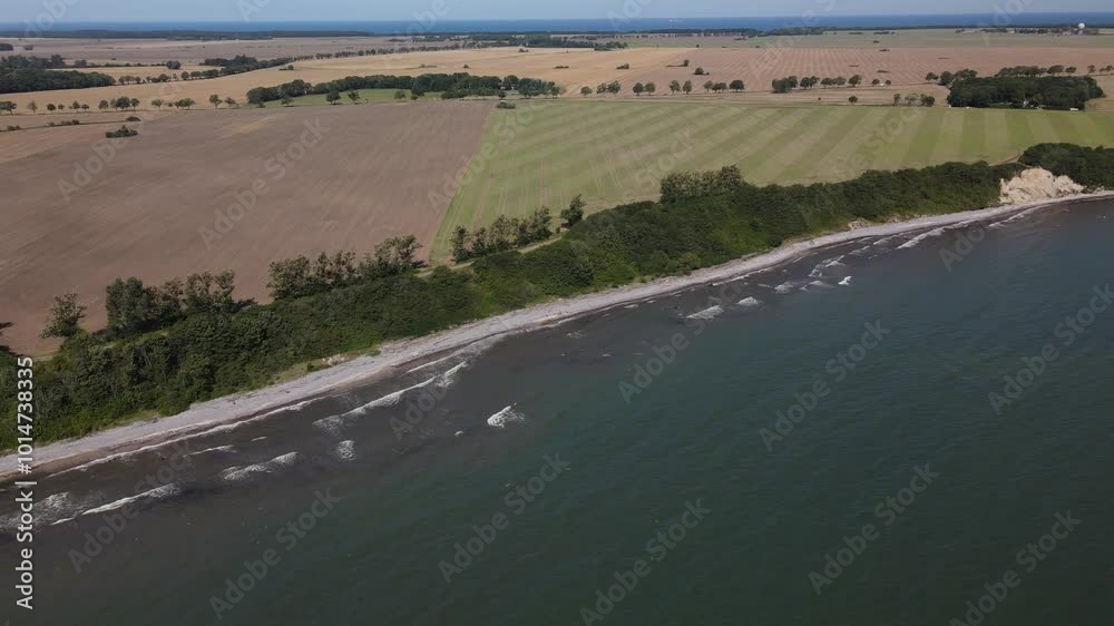 Fly over across the Rügen Island by passing the chalk cliffs and the Baltic ocean during summer time Fly over across the Rügen Island by passing the chalk cliffs and the Baltic ocean during summer time