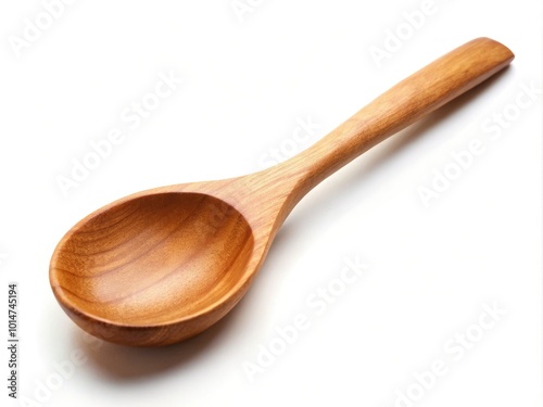 Classic wooden spoon on white backdrop, ideal for baking and cooking. Perfect for culinary photography, captures the essence of kitchen utensils elegantly.