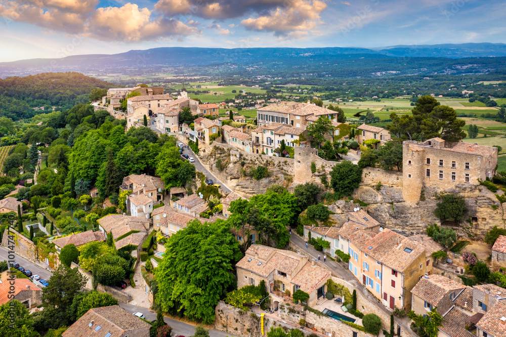 Menerbes village in Provence on a summer day, France, Luberon, Vaucluse. Village of Menerbes, the village and the Luberon mountains also called the most beautiful village of Luberon, France, Provence. Menerbes village in Provence on a summer day, France, Luberon, Vaucluse. Village of Menerbes, the village and the Luberon mountains also called the most beautiful village of Luberon, France, Provence.