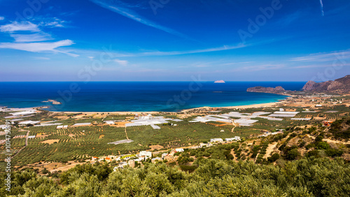 Fototapeta Naklejka Na Ścianę i Meble -  Shot of beautiful turquoise beach Falasarna (Falassarna) in Crete, Greece. View of famous paradise sandy deep turquoise beach of Falasarna (Phalasarna) in North West, Crete island, Greece.