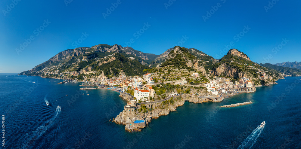 Obraz premium View of beautiful Amalfi town, Campania, Italy. Amalfi coast is most popular travel and holiday destination in Europe. Amalfi cityscape on coast line of mediterranean sea, Amalfi coast, Italy.