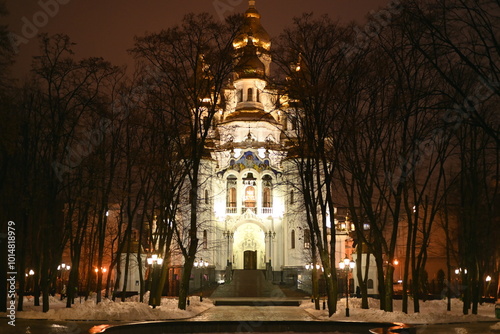 Assumption or Dormition (Uspenskiy) Cathedral at night in Kharkiv, Ukraine. photo