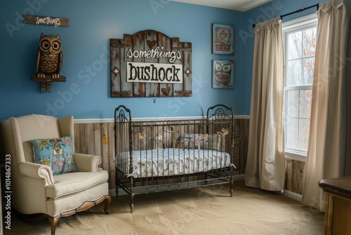 Nursery with iron crib, owl wall art, vintage chair, and 