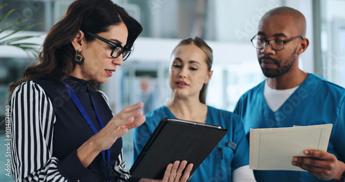 Medical team, tablet and meeting in clinic for advice, innovation and feedback with patient report. Hospital CEO, people or tech in lobby with results, solution or professional opinion for healthcare