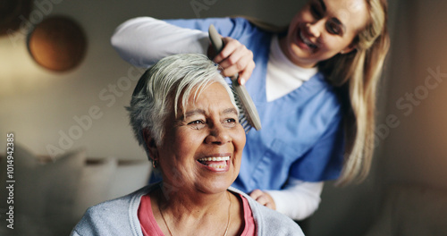 Brush, help and nurse with patient for hair in retirement home at healthcare consultation. Happy, medical checkup and caregiver assisting elderly woman with hairstyle in morning at nursing facility.