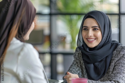 A woman enjoying her morning coffee at a table, perfect for lifestyle or office scenes