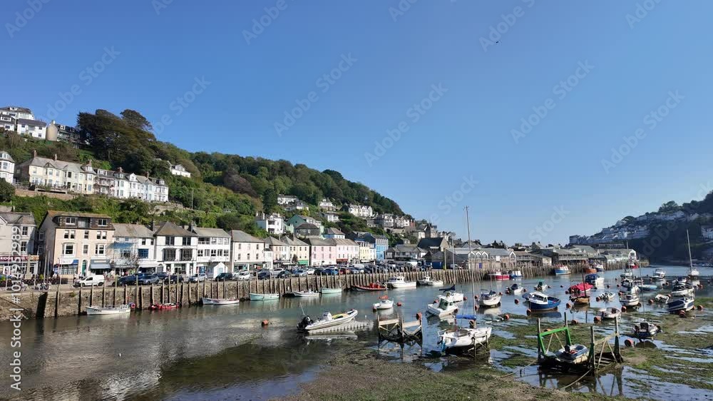Looe Cornwall England. 30.09.2024. Video. Landscape view of East Looe resort at low tide on the Cornish coast UK. Looe Cornwall England. 30.09.2024. Video. Landscape view of East Looe resort at low tide on the Cornish coast UK.