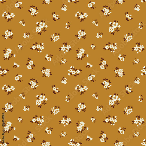 Vintage floral pattern in small abstract flowers. Small ivory white flowers. Gold yellow background. Ditsy print. Floral seamless background. Retro template for fashion prints. Stock 