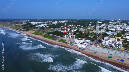 Drone view of lighthouse tower in Gopalpur sea beach coastline.  photo