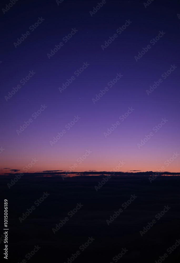 Twilight Clouds Stretching into Horizon Under Starry Sky with Deepening Purple Tones Twilight Clouds Stretching into Horizon Under Starry Sky with Deepening Purple Tones