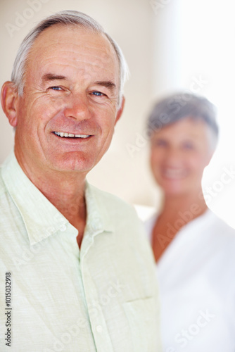 Home, senior man and smile in portrait for retirement, memory and laughing with positive attitude. Elderly couple, male person and old woman in marriage for commitment, connection and happy in house