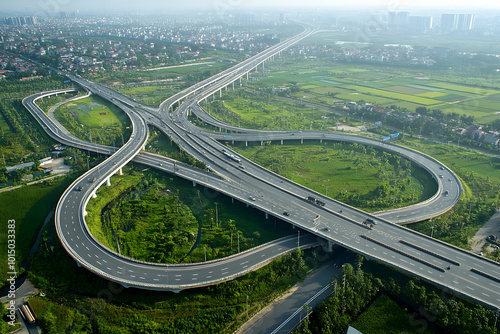 Aerial View of Highway Interchange with Green Landscape Photo