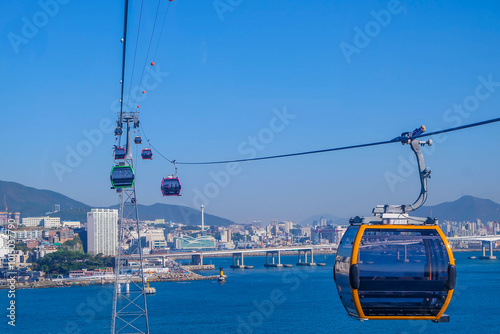 Beautiful landscape of cable car transportation system for tourist traveling at songdo beach, this place is one of the famous tourist destination in Busan, South Korea photo