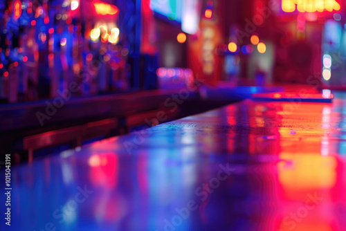 Bar with blue and red light, creating a vibrant and lively atmosphere.