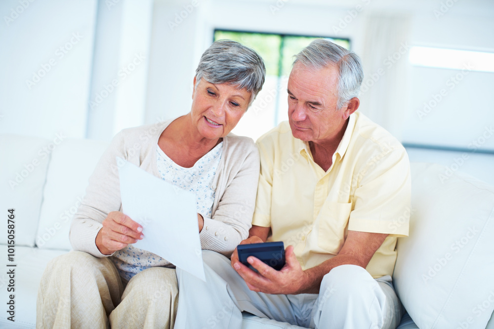 Senior, couple and documents with calculator on sofa with budget planning, asset management and discussion. Elderly, people and talking in home with paperwork for pension funding, bills and banking Senior, couple and documents with calculator on sofa with budget planning, asset management and discussion. Elderly, people and talking in home with paperwork for pension funding, bills and banking