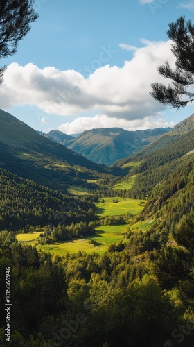 Mountain landscape with green meadows and blue sky 