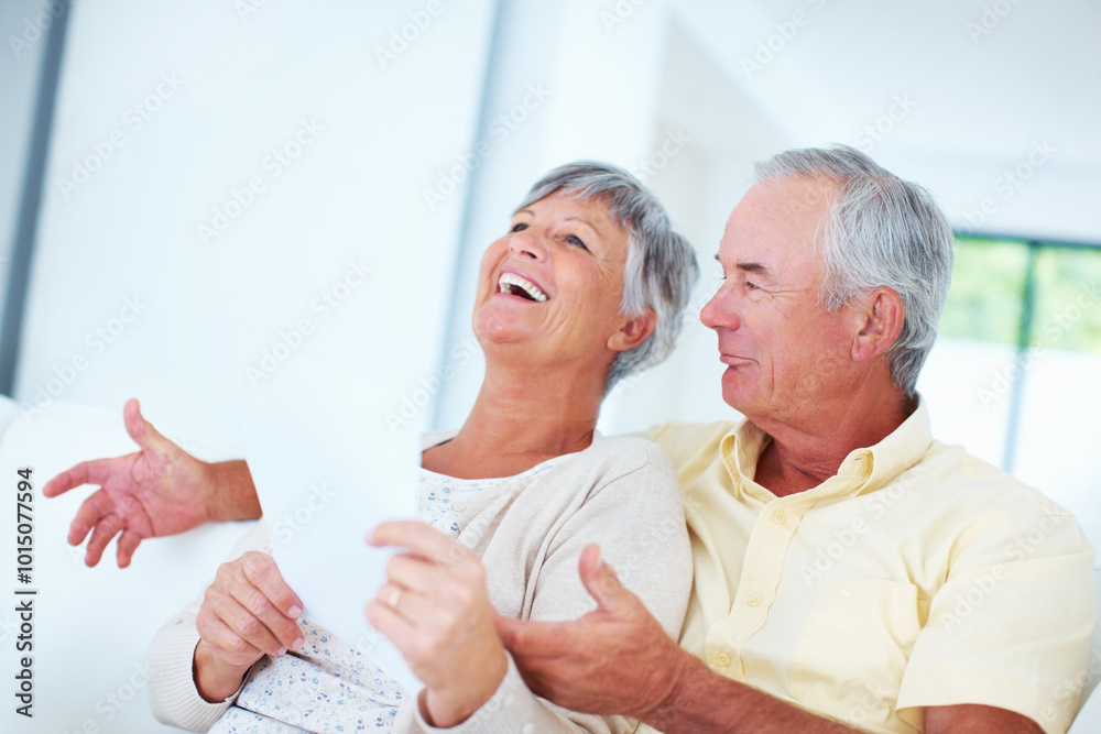 Mature, happy couple and paperwork with bills for finance, budget planning or mortgage payments at home. Elderly, man and woman with documents for expenses, receipts or invoice on couch at house Mature, happy couple and paperwork with bills for finance, budget planning or mortgage payments at home. Elderly, man and woman with documents for expenses, receipts or invoice on couch at house