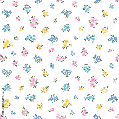 Cute floral pattern in small flowers and leaves. Delicate multicolor flowers. White background. Liberty retro print. Floral seamless background. Bright template for fashion prints. Stock