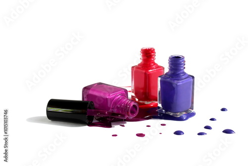 Open spill varnish of three colors in glass bottles is located on a white background.	 photo