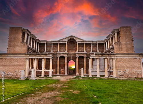 Wide angle photo of Temple of Artemis at Sardes Lydia Ancient City at sunset. Sardes, sardis or sardeis ancient city as tourism and leisure concept.