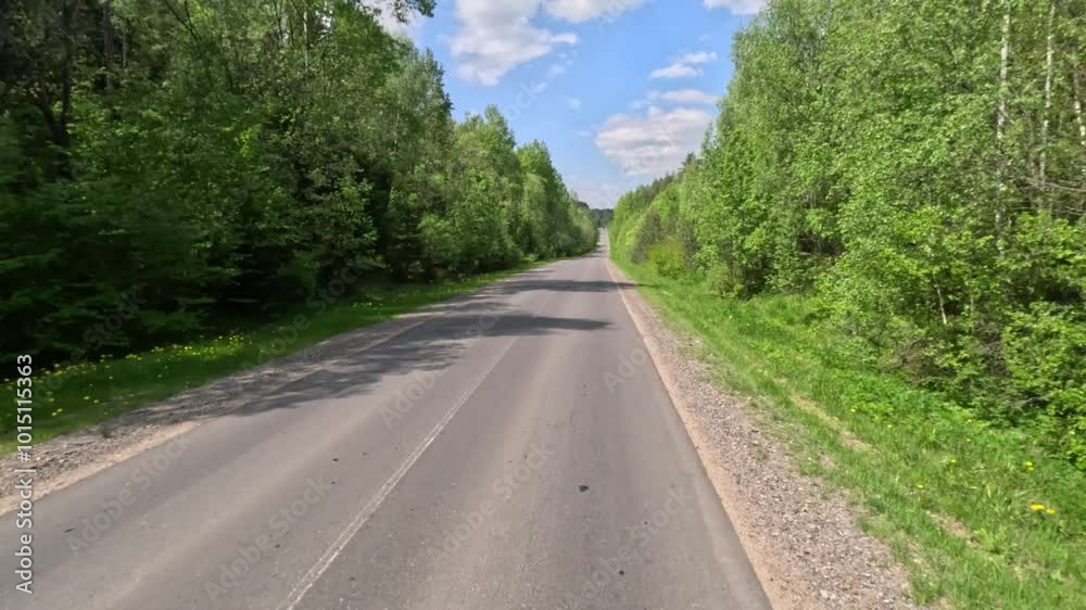 Road view on a summer day. Highways and cars, roadside and white road line markings. Road view on a summer day. Highways and cars, roadside and white road line markings.
