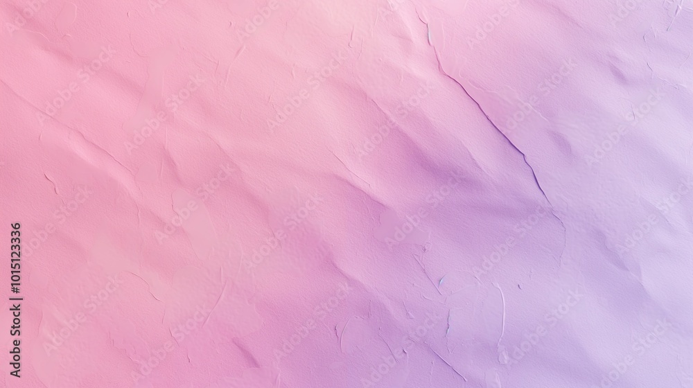 Fototapeta premium Soft pastel pink and lavender paper texture, with a delicate gradient effect for a soothing, abstract artistic background.