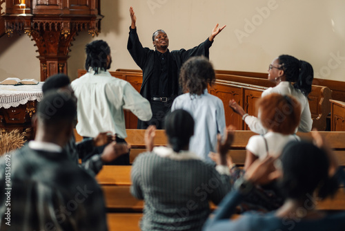 Photos African american pastor leading congregation in prayer