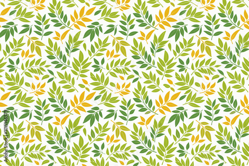 Seamless pattern with green and yellow curry leaves on a white background