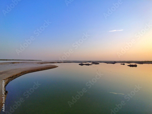 The Indus River. 
Pakistan's lifeline, harboring the ancient Indus Valley Civilization and nurturing diverse wildlife, flora, and vital migratory bird habitats along the Indus Flyway Zone. photo